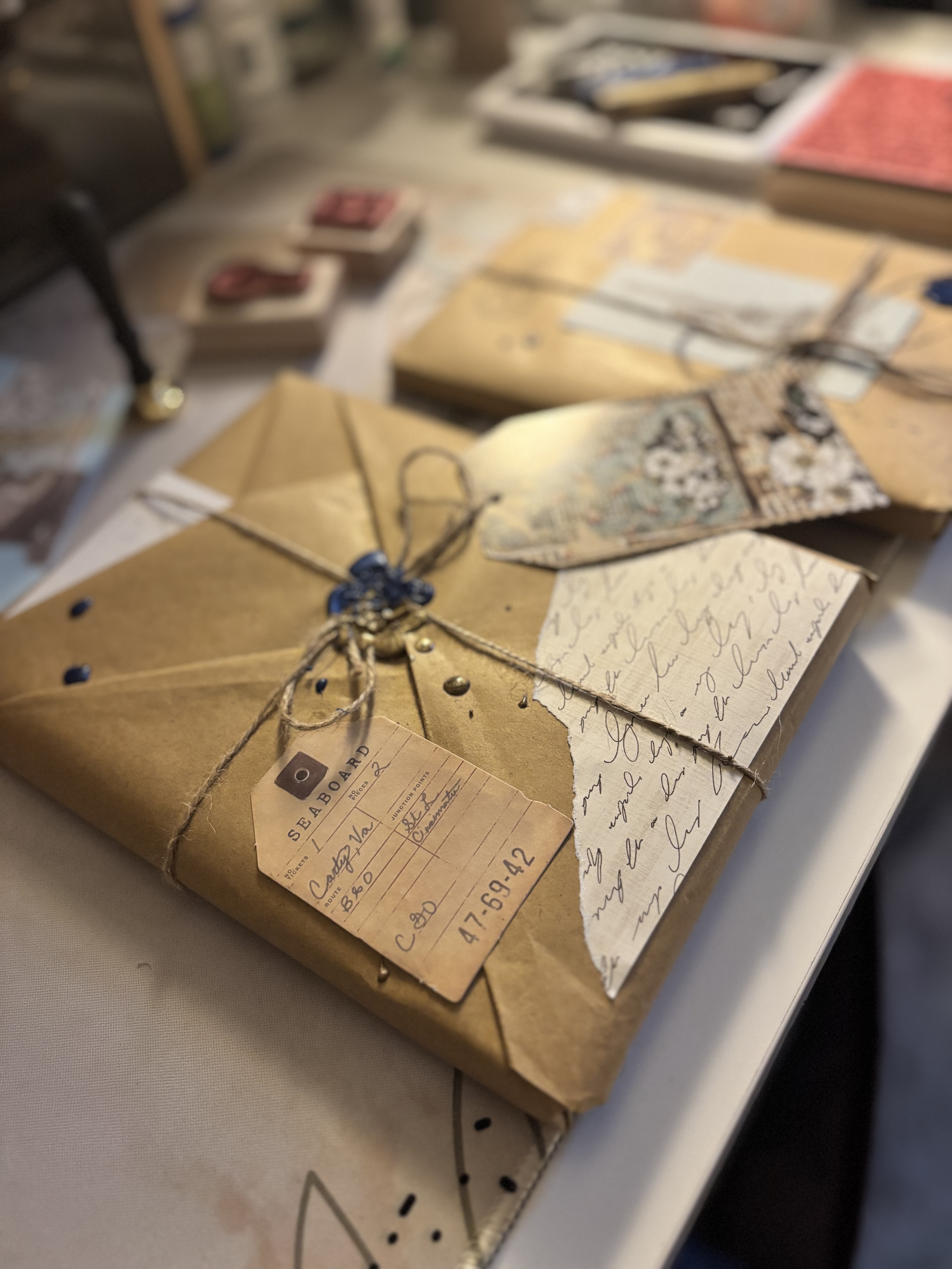 Curated correspondence — handwritten packages with wax seals